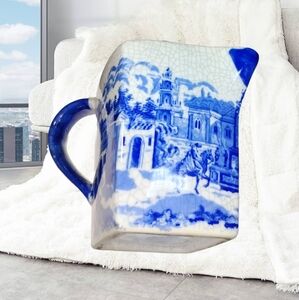 Blue and White Ceramic Pitcher